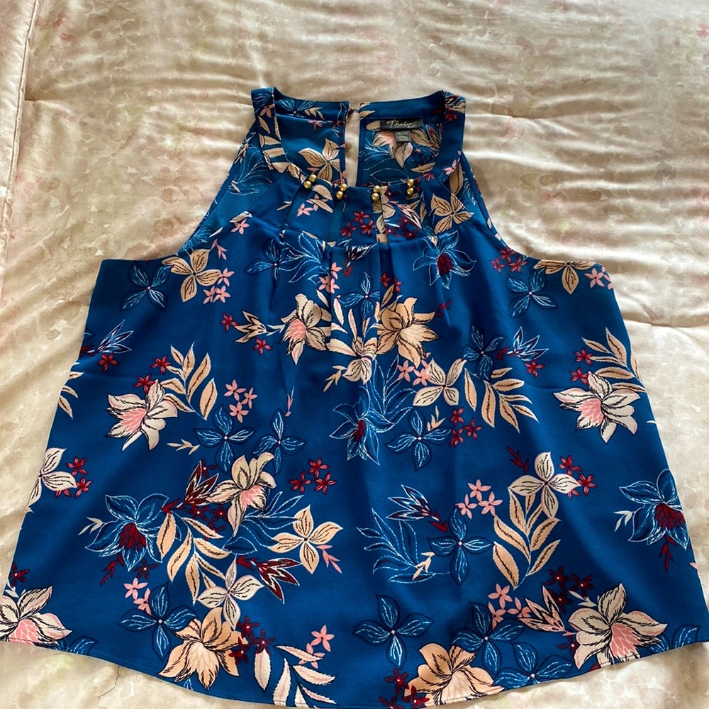 Gorgeous halter style top with gold embellishments